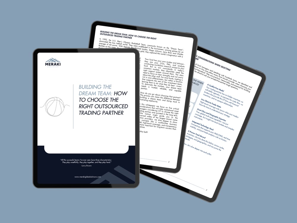 Building the Dream Team whitepaper displayed on tablets